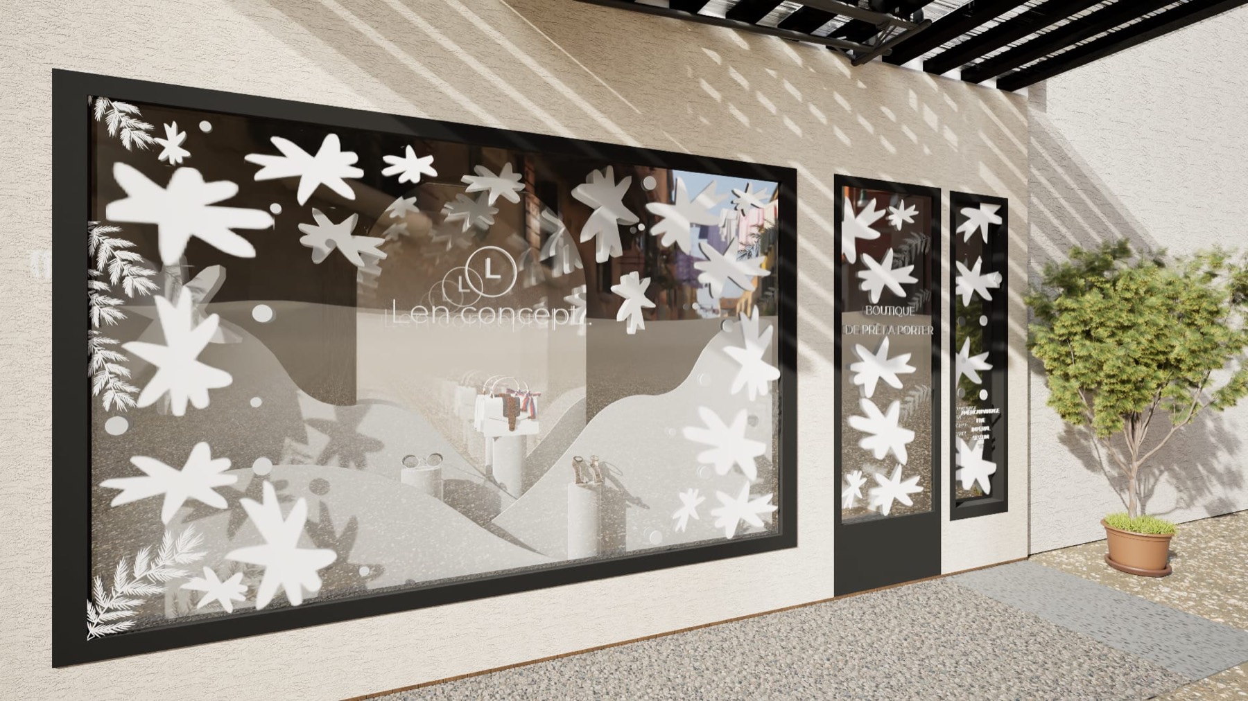 Vitrophanie de Noël en flocons découpés sur la vitrine de la boutique Len Concept